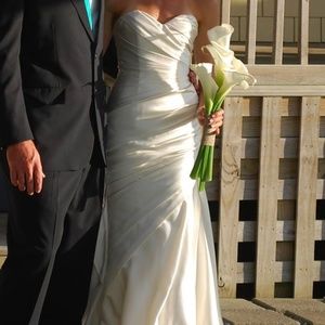 Size 4-6 wedding dress worn once.  Strapless, sweetheart neckline, mermaid.